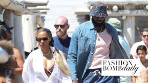 Savannah James Was Captured with Lebron James in Saint-Tropez in a $1,000 Cherry Printed Valentino Bikini with a $933 White Ferragamo Kaftan Shirt