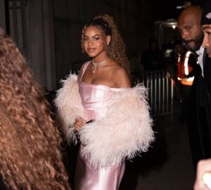 Blue Ivy Carter, 13, Shines in a Pink Babyboo Satin Gown and Feather Shawl at the Angel Ball