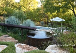 Terraced backyard for outdoor living, plus meadowy entry garden