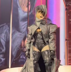 Lil’ Kim Performs Quiet Storm in a Black Sculptural Look at Cardi B’s Sold-Out Little Miss Drama New York Show