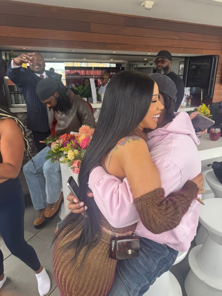 Cardi B Wore a Brown Vivienne Westwood Knit Set to the Diggs Deep Foundation Wellness Event with Stefon Diggs
