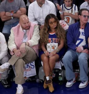 Azzy Milan and Dad Fat Joe Step Out in Louis Vuitton and a $250K Hermès Faubourg Birkin Bag at the New York Knicks NBA Finals